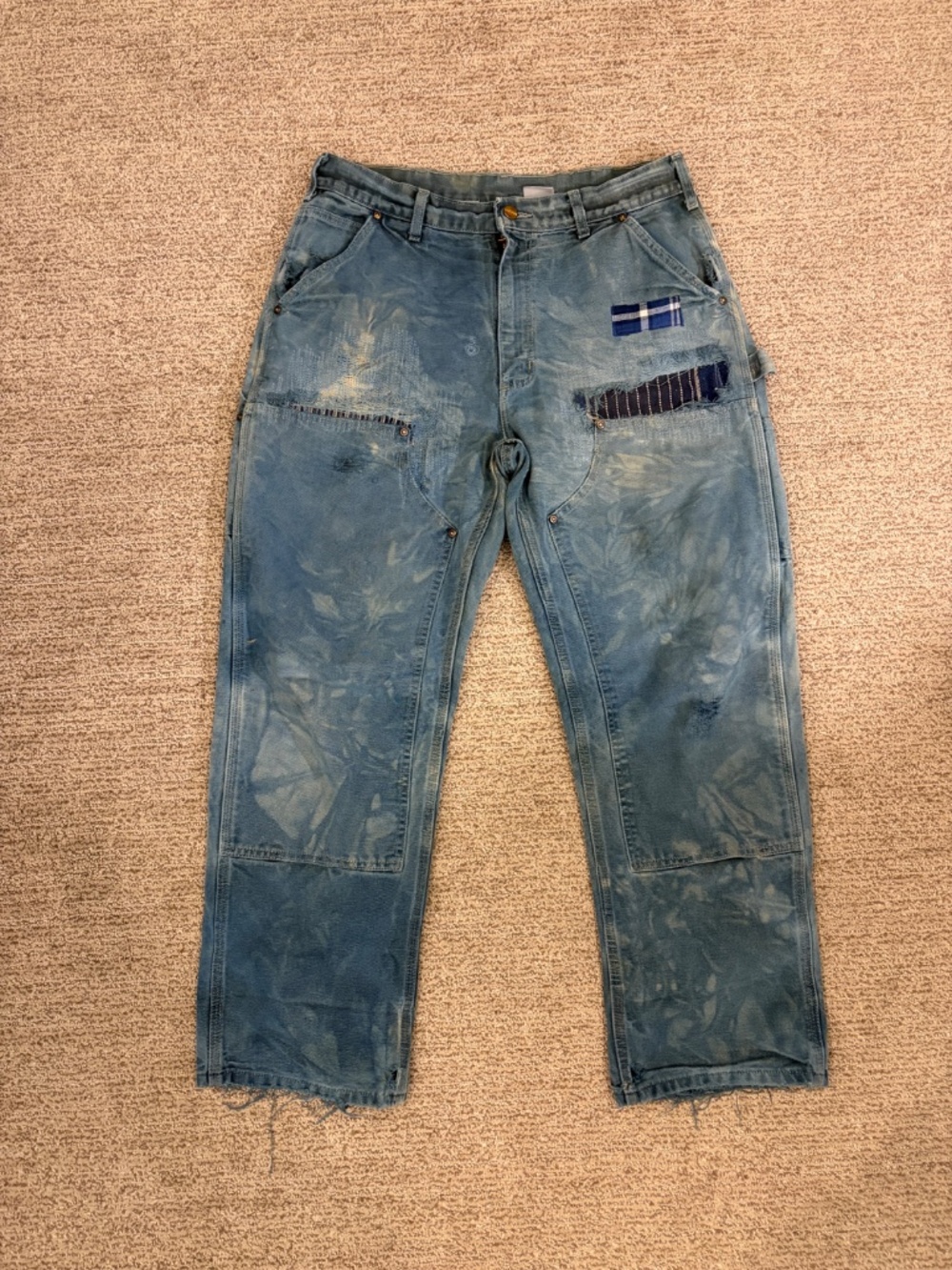 Carhartt double-front pants - indigo-dyed, patched, distressed